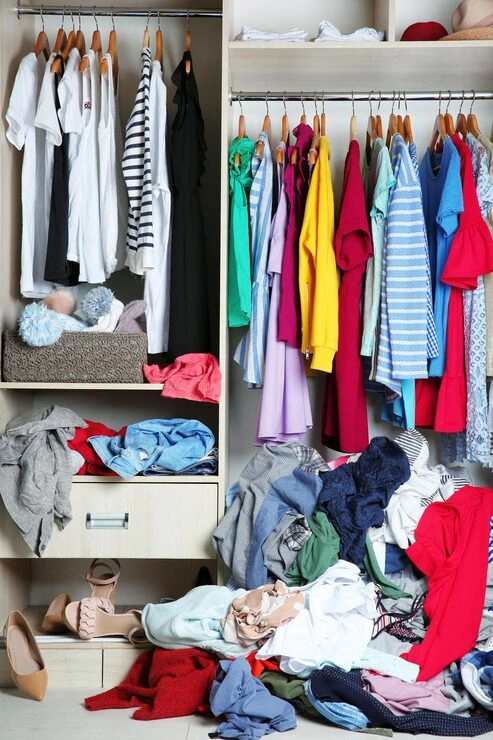 packing too many clothes inside cupboard